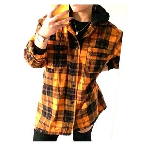 Orange and black plaid shirt with black hood